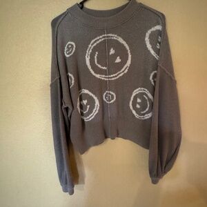 Smiley face sweater